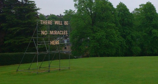 "There will be no miracles here." The grounds of my girlfriend's workplace. I took this before we met. I disagree wholeheartedly.